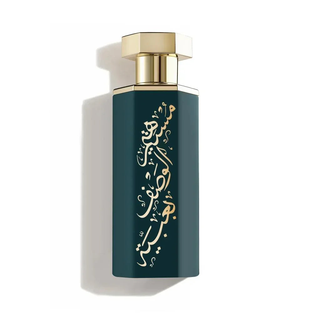 Elegant dark green perfume bottle with gold Arabic calligraphy and luxurious cap