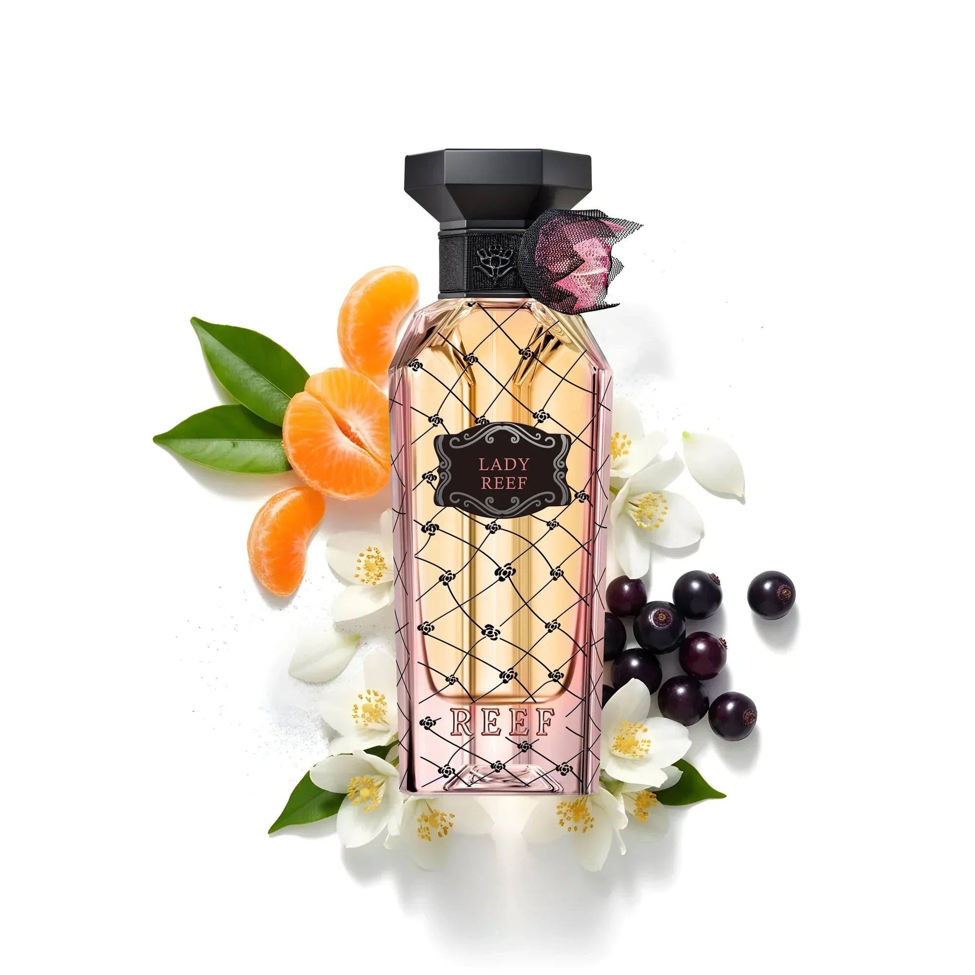 Lady Reef perfume bottle with citrus, berries, and white flowers, evoking oriental luxury