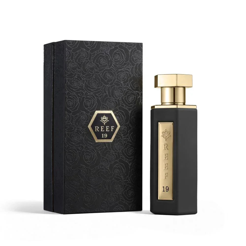 REEF 19 luxury perfume bottle with elegant black and gold packaging, featuring rose motifs