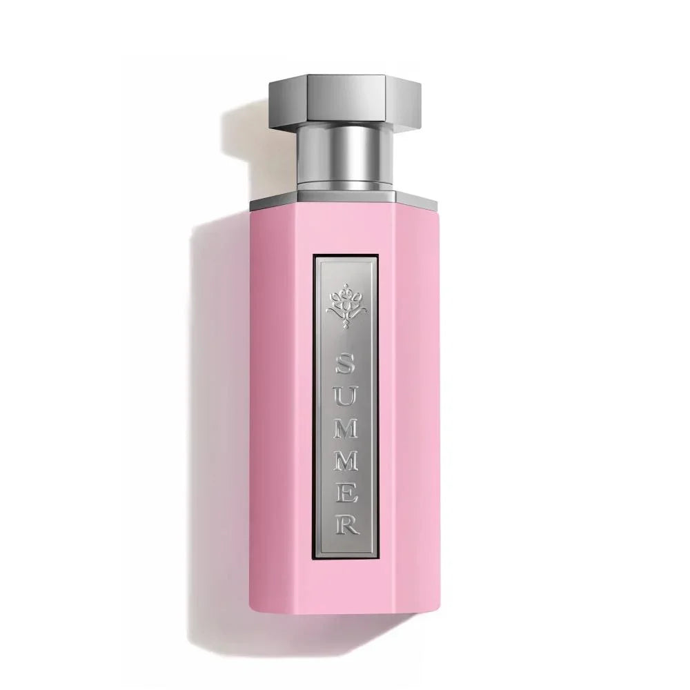Pink Summer perfume bottle with silver cap and floral emblem, evoking fresh, blooming garden notes
